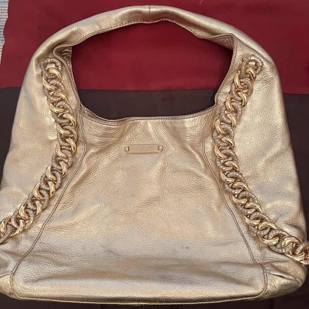 This a a gold slouchy Michael Kors